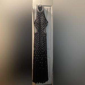 Black with silver crystal sparkles prom or floor length gown event.
